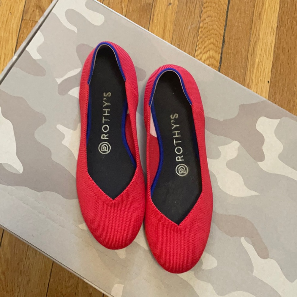 Ruby red Rothy’s round toe flats